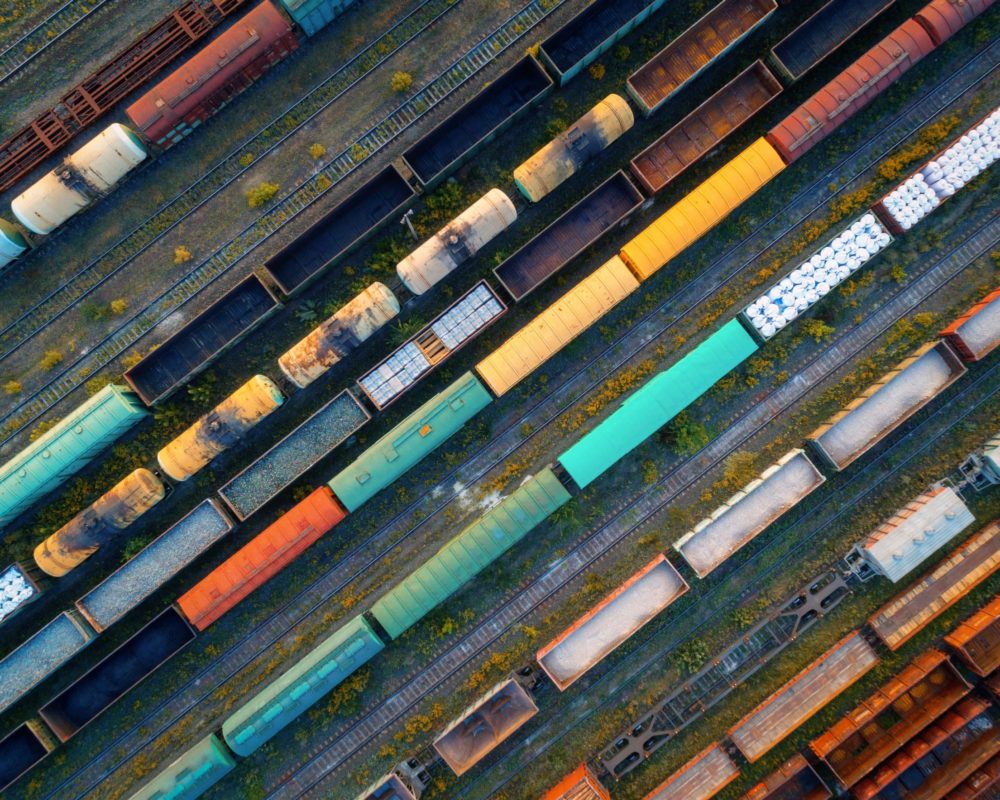 aerial-view-of-colorful-freight-trains-P485RSJ-min
